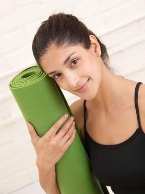 girl with yoga mat